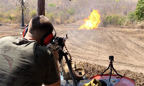 Shooting PKM machine into gas tank Cambodia